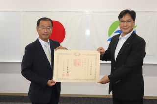 8.27紺綬喪章伝達式（リアル建設株式会社）